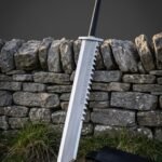 Runetooth Hand Forged 1095 Steel Rune Sword | 38 Inch Overall | Sawtooth Spine and Elder Futhark Etching with Black Leather Scabbard | Norse Collector Gift | RK-1944