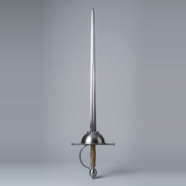 Sharp cup hilt rapier with a solid unpierced cup guard, long quillons ending in ball finials, knuckle bow and brass wire wrapped grip, the blade running to an acute point, against a plain grey studio backdrop