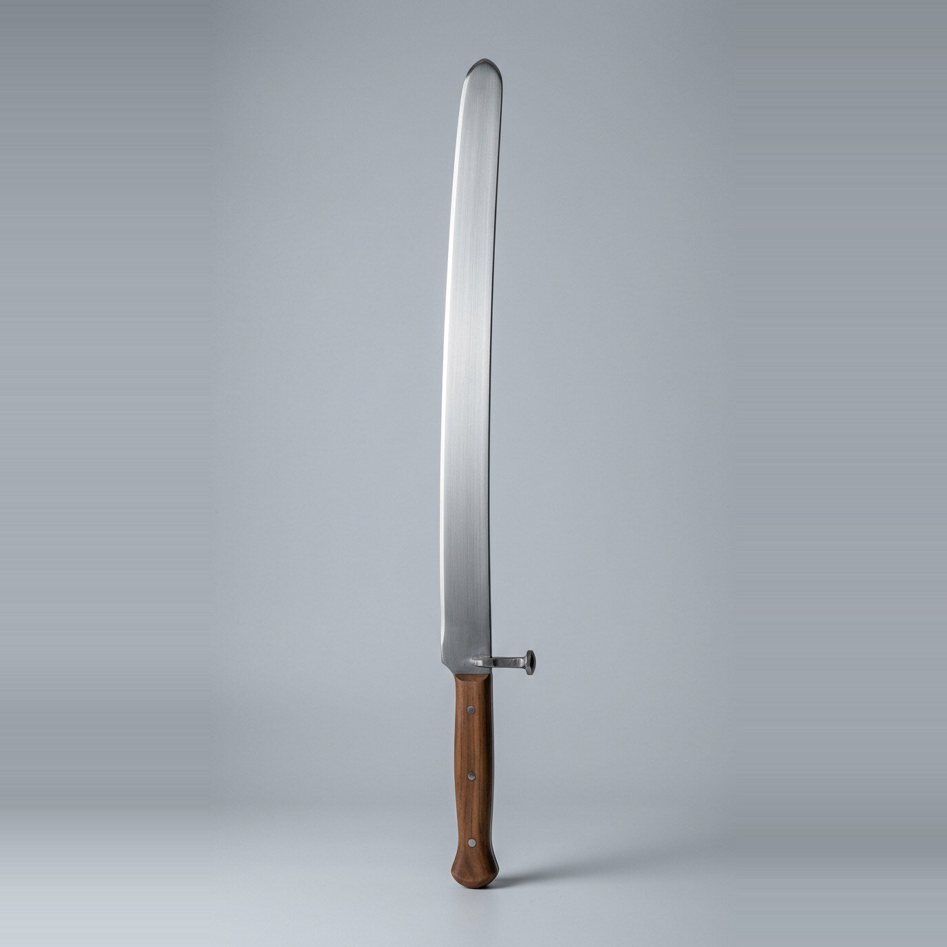 Ostrevak steel dussack Steel dussack trainer with a nagel peened straight through the blade, no cross at all, wooden scales held by three steel rivets and a rounded blunt tip against a plain grey studio backdrop