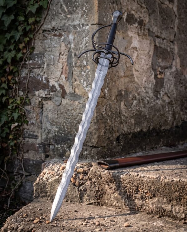 Waves running the full length of a folded Damascus flame blade above a blackened hilt